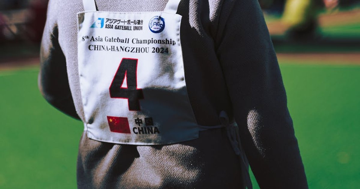 Close-up of player with jersey at 8th Asia Gateball Championship in Hangzhou, China.