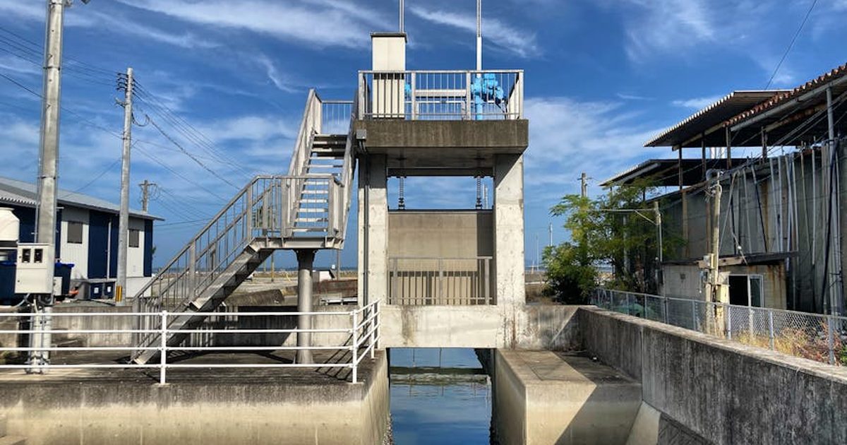 A water control gate structure in an industrial area of Japan.