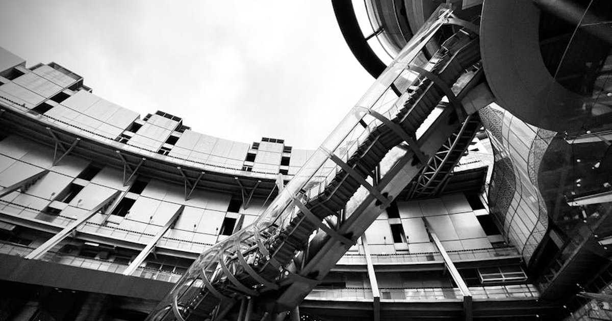 Black and white view of a modern shopping mall in Hsinchu City, Taiwan.