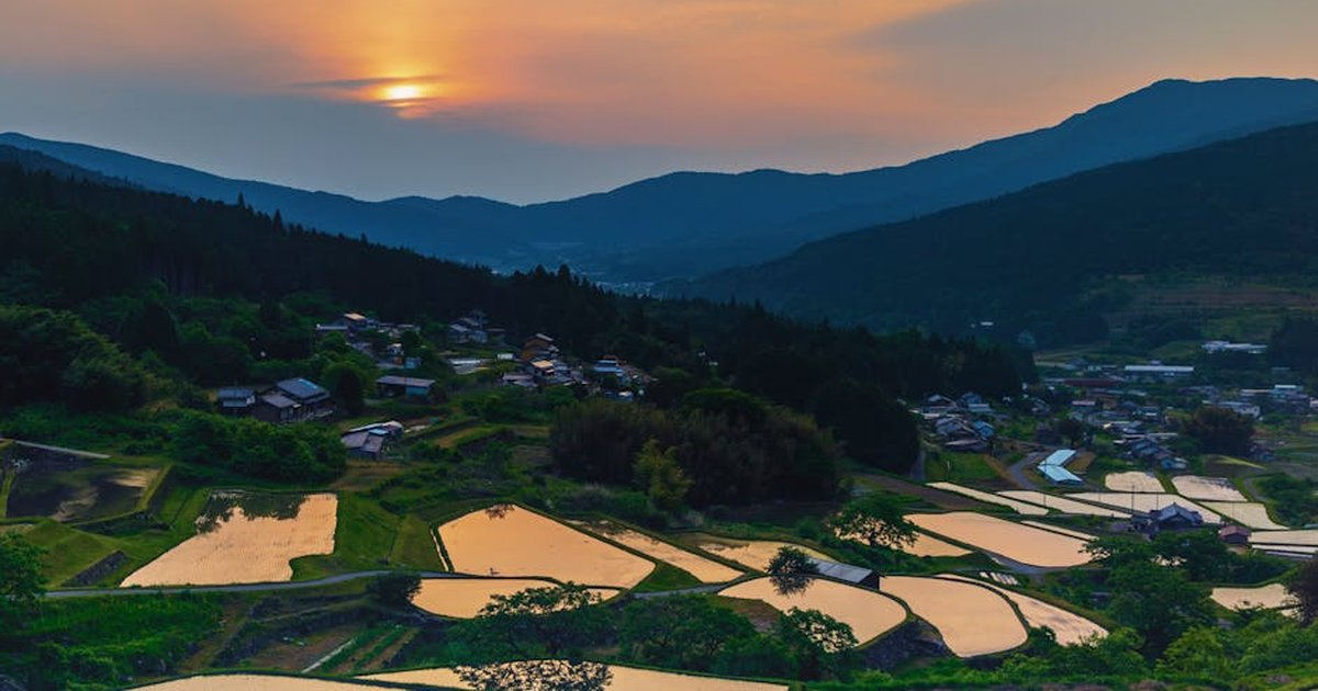 Beautiful aerial view of terraced fields in Ena, Gifu, Japan at sunset.