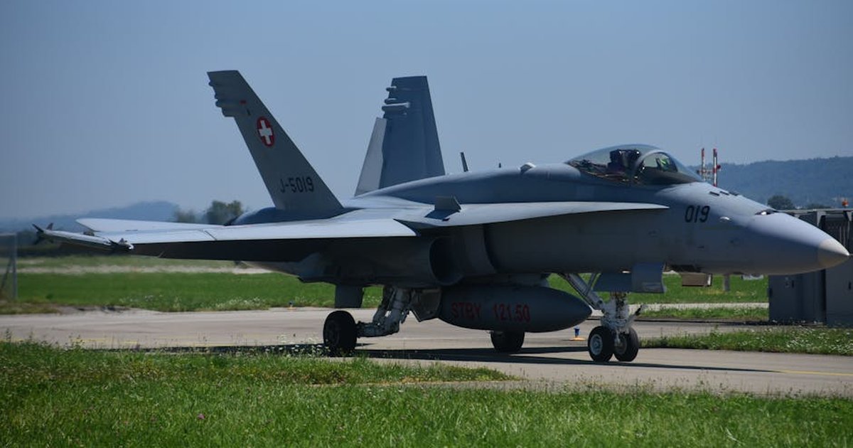Swiss Air Force F/A-18 Hornet jet parked on the airfield at Payerne, Switzerland.