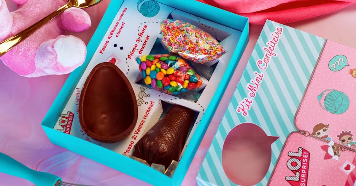 Fun and vibrant candy making kit with chocolate mold, sprinkles, and instructions for creativity.