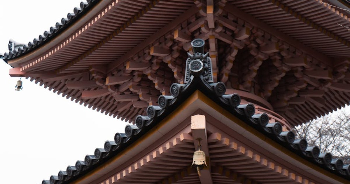 Close-up of a traditional Japanese pagoda roof in Nara, showcasing intricate architecture.