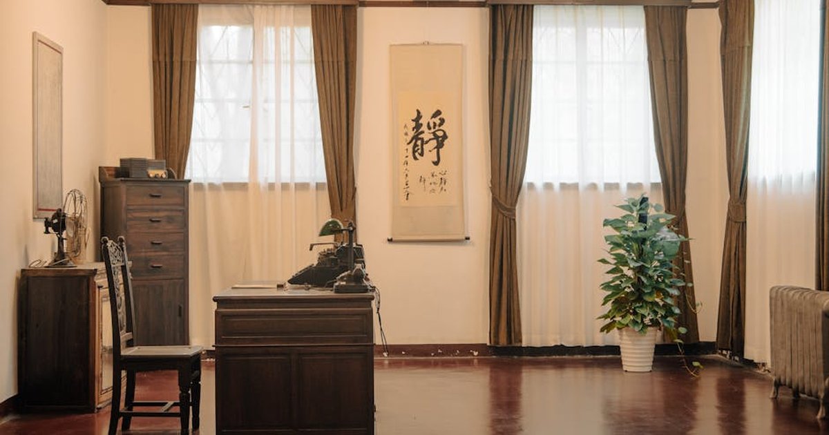 A vintage-style office room in Meiling Palace, Nanjing, featuring classic wooden furniture and Chinese decor.
