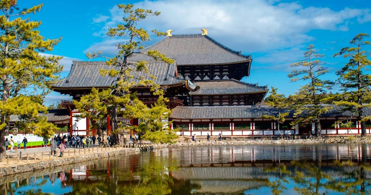 Scenic view of Todaiji Temple reflected in a tranquil pond, Nara, Japan.