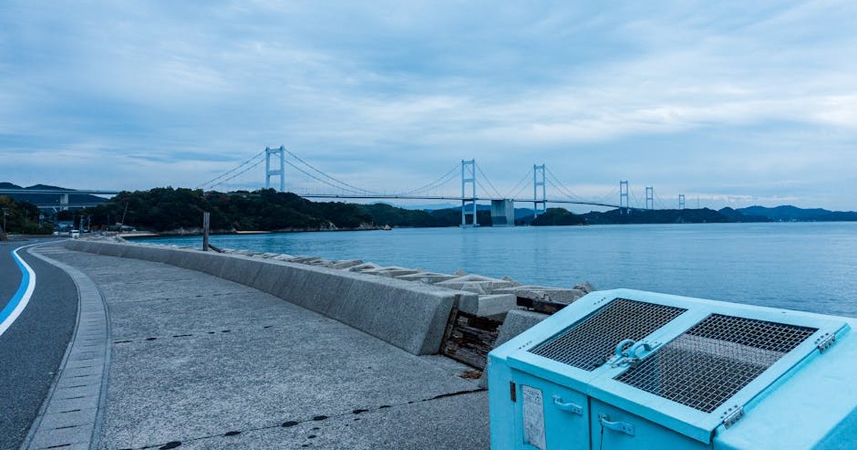 Beautiful view of a bridge over the sea in Onomichi, Japan. Perfect for travel inspiration.