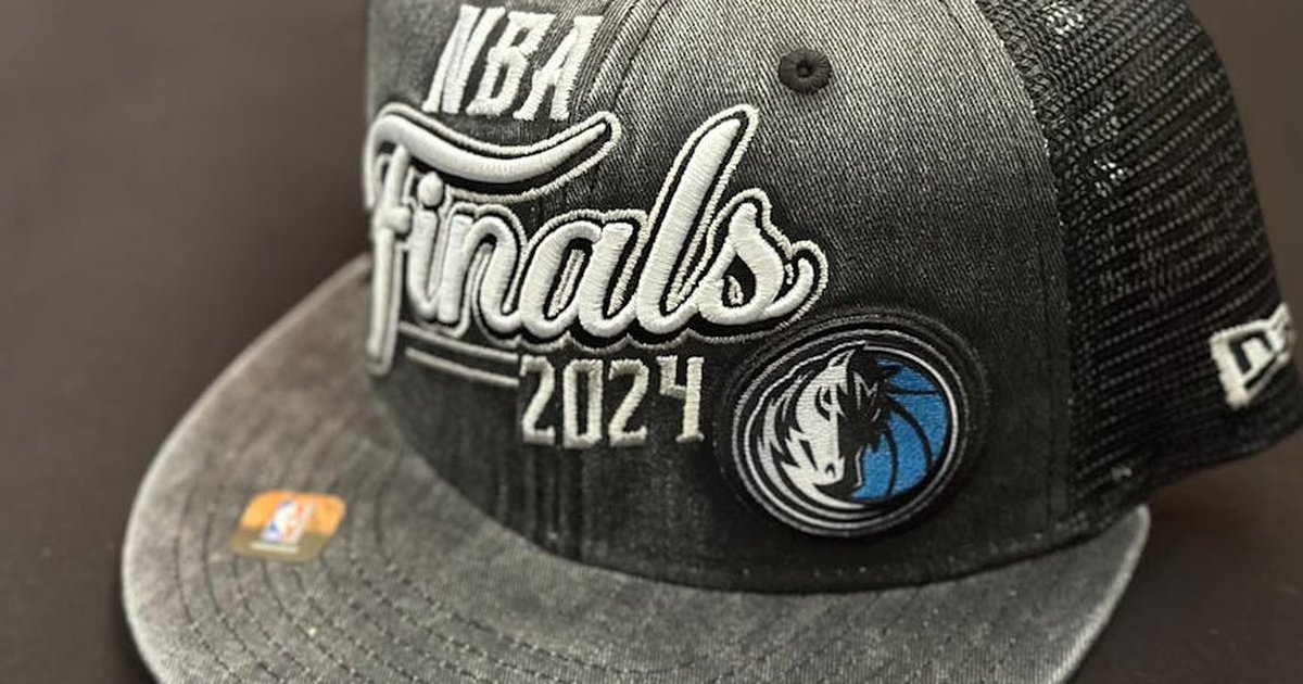 Close-up of a 2024 NBA Finals cap with Dallas Mavericks logo, perfect for sports enthusiasts.