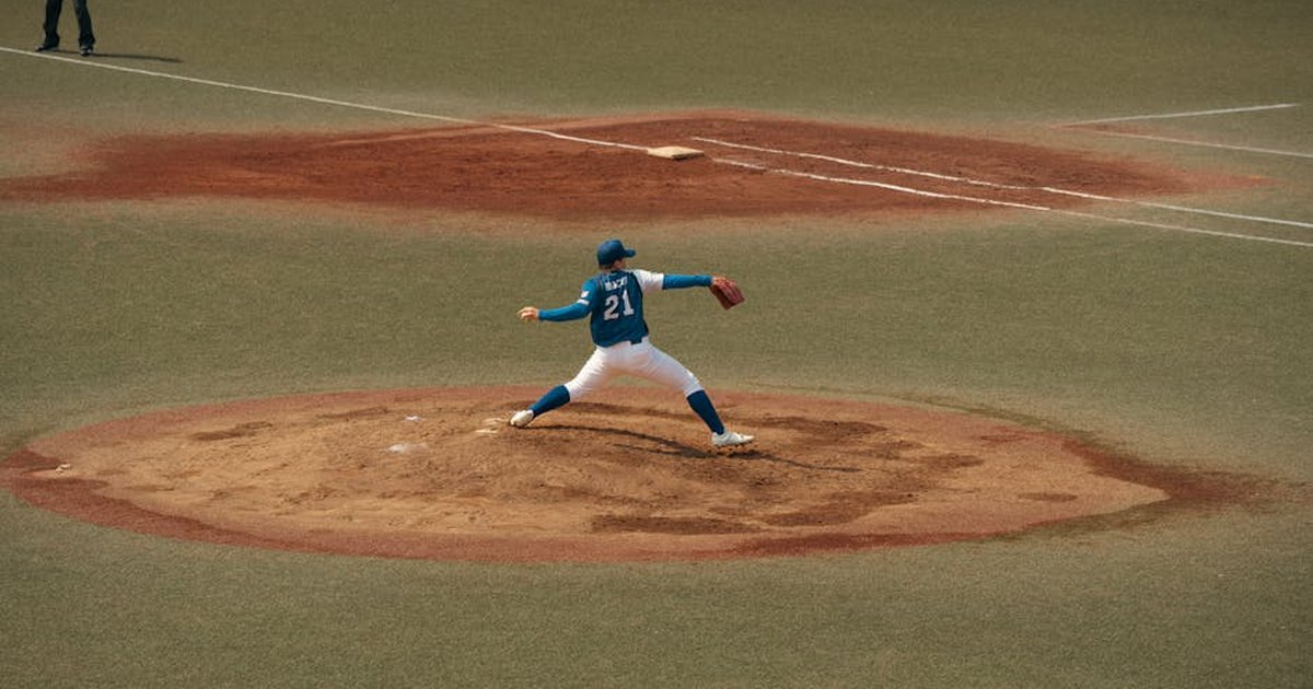 Baseball player mid-throw during a game at a Tokyo baseball field. Capturing the intensity and focus of sports.