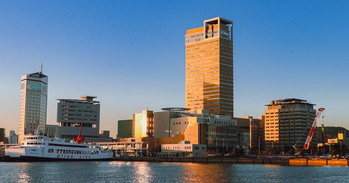 Stunning sunset highlights the skyline and port area of Sunport Takamatsu in Kagawa, Japan.