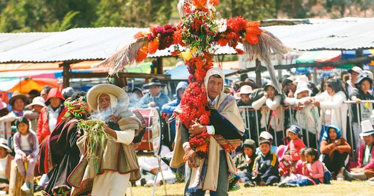 Vibrant celebration in Peru with colorful costumes and floral decorations, rich in cultural heritage.