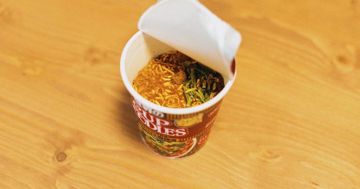 Delicious cup of instant noodles ready to prepare, showcasing Japanese fast food culture.