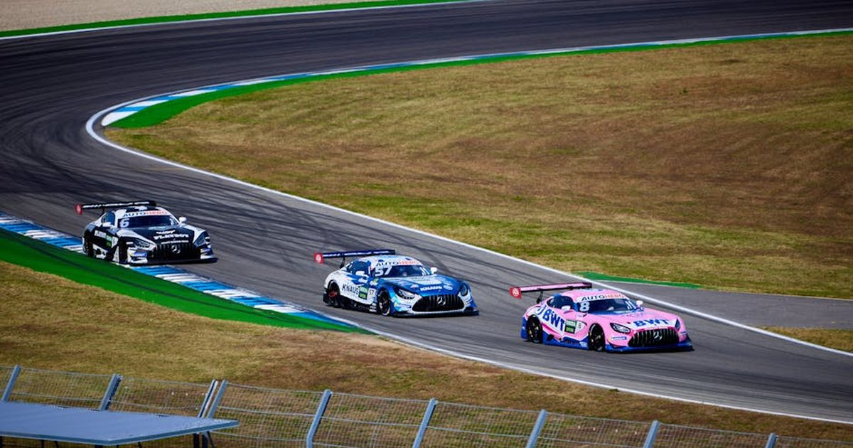 Exciting sports car race on Hockenheim Circuit, showcasing speed and skill on the track.