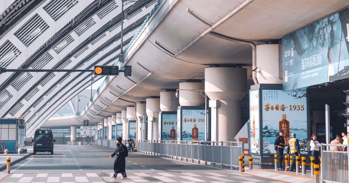 View of Chengdu airport entrance showcasing modern architecture and urban design.
