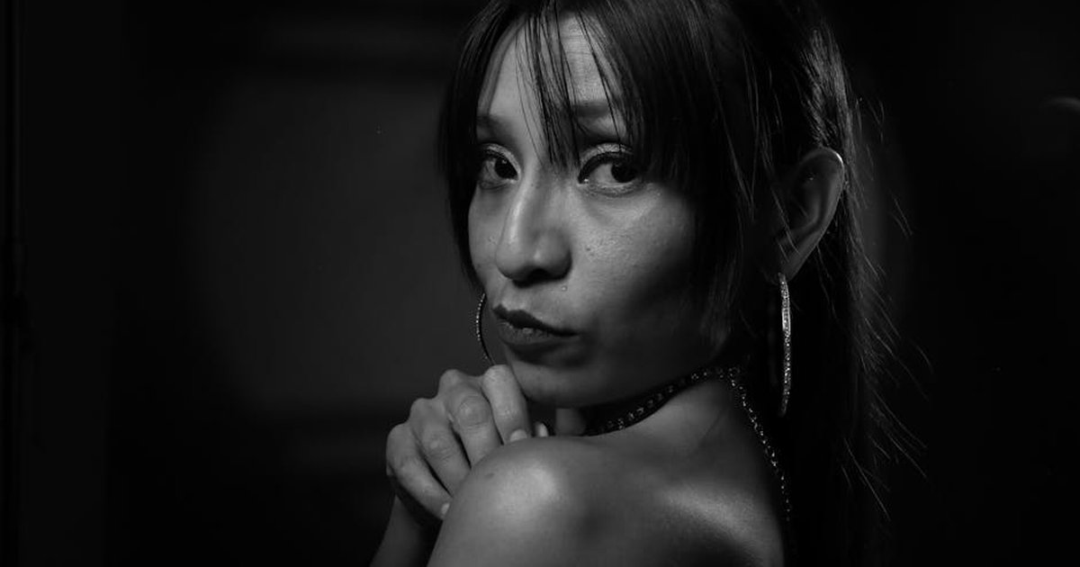 Stunning black and white portrait featuring a woman with dramatic lighting and expression.