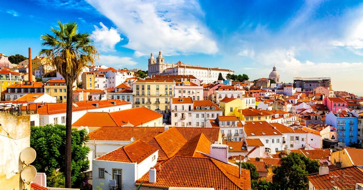 Vibrant rooftops and historic architecture in Lisbon's scenic Alfama district.