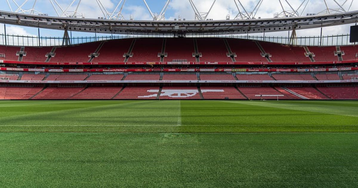 Wide view of an empty Emirates Stadium, home of Arsenal FC, in North London, England.