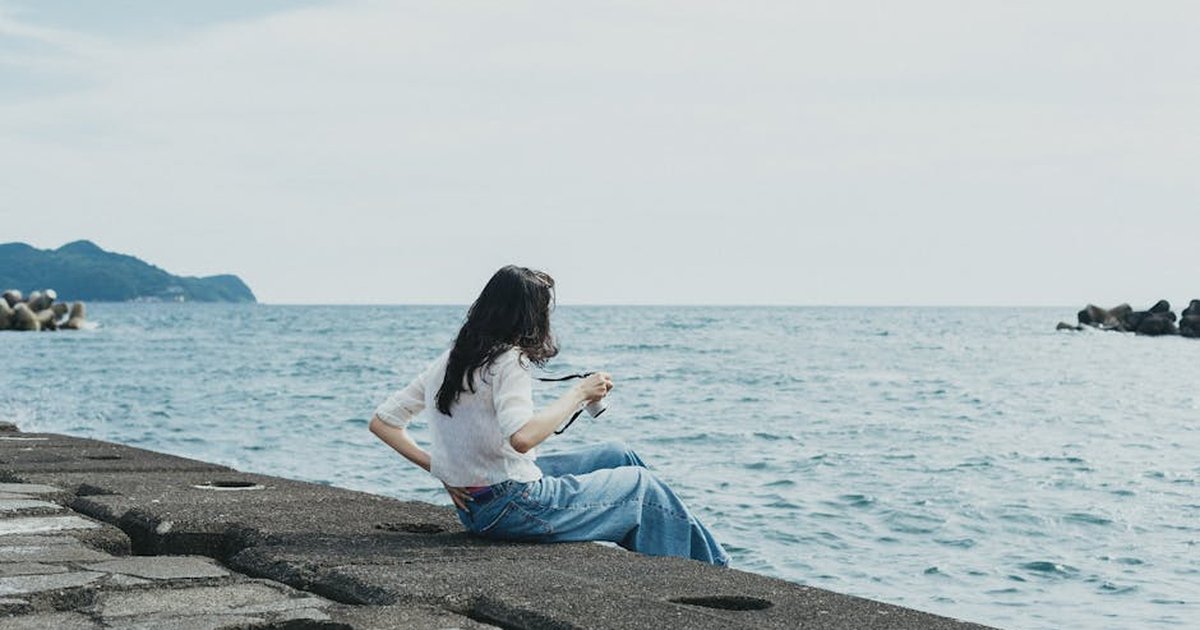 Serene moment by the sea at Nishi-Izu, capturing relaxation and tranquility.