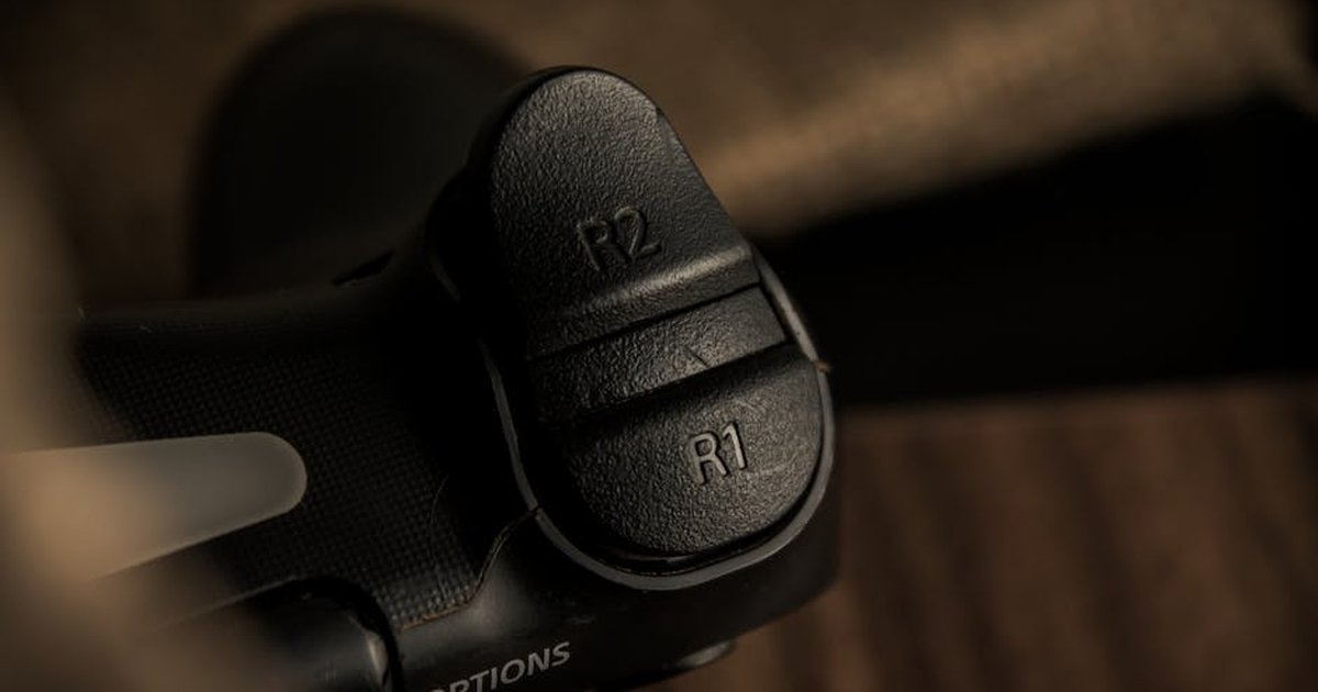 Detailed close-up of R1 and R2 triggers on a gaming controller.