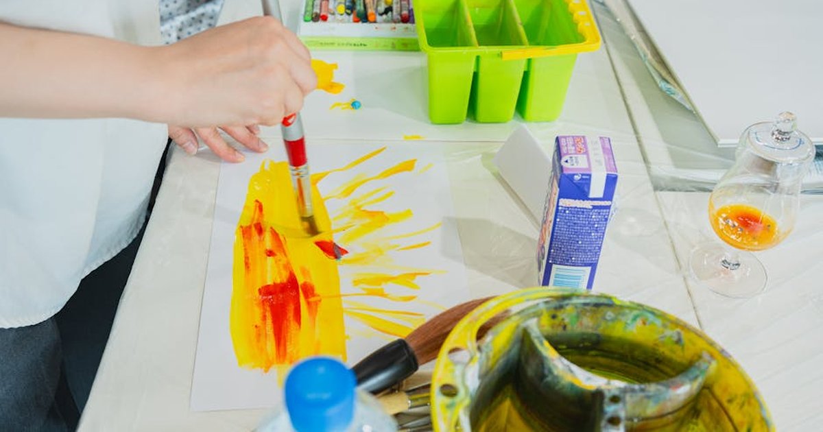 Explore creativity in a Tokyo art class, capturing vibrant brush strokes and colorful palettes.