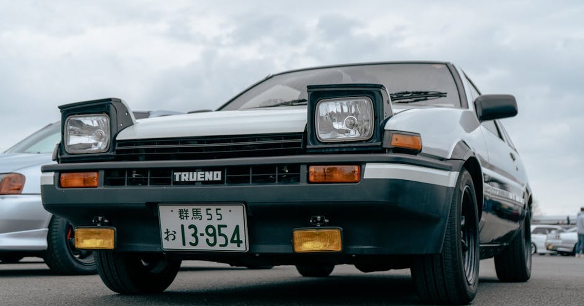Classic Toyota Trueno AE86 car showcased at Japfest in England, highlighting iconic automotive design.