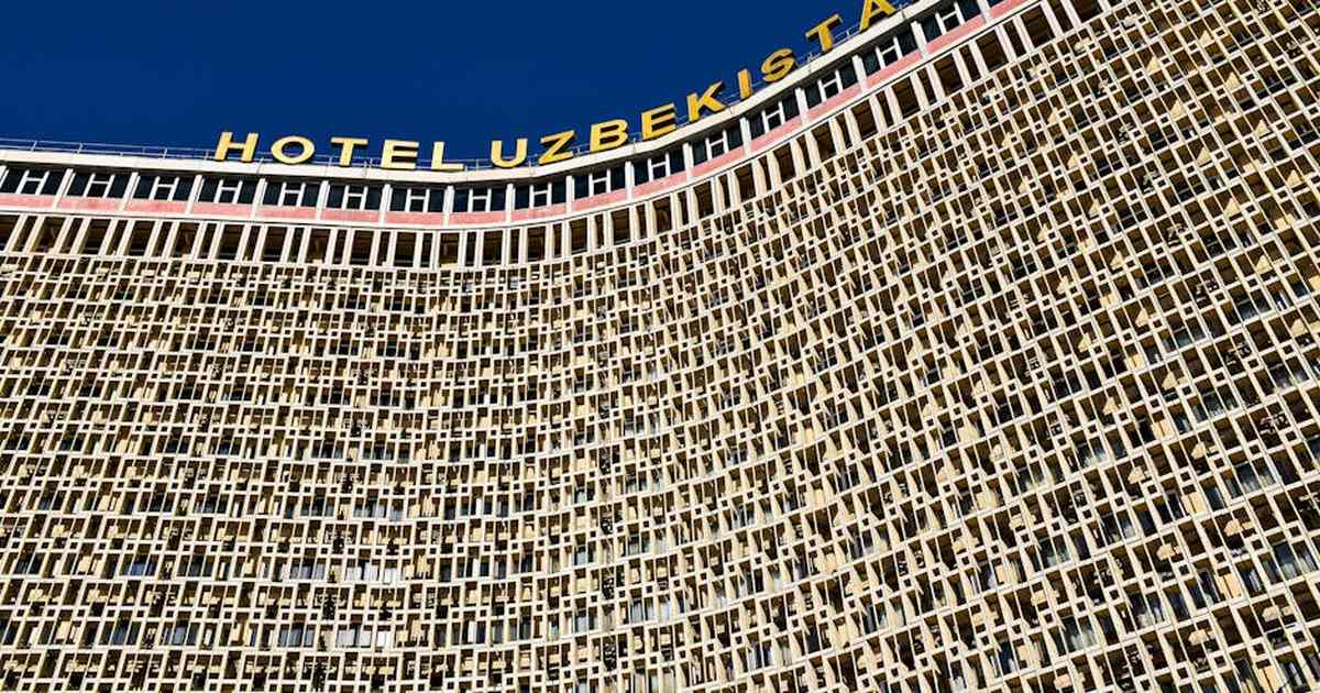Detailed facade view of the Hotel Uzbekistan landmark in Tashkent, showcasing unique architecture.