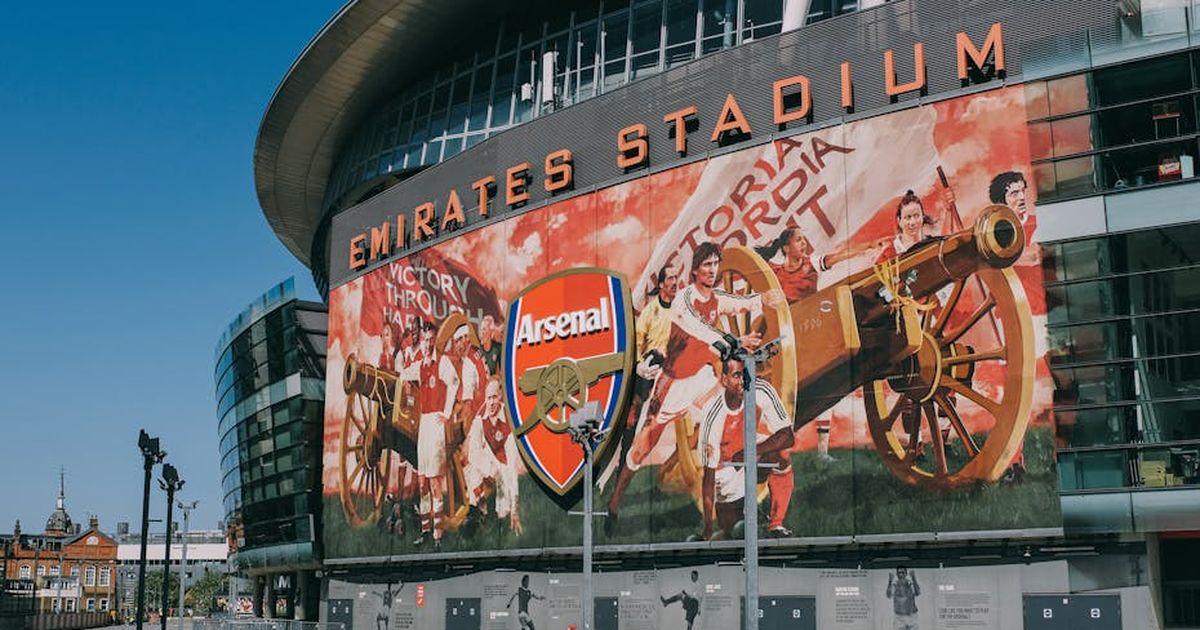 Exterior view of the iconic Emirates Stadium, home of Arsenal FC in London, England.
