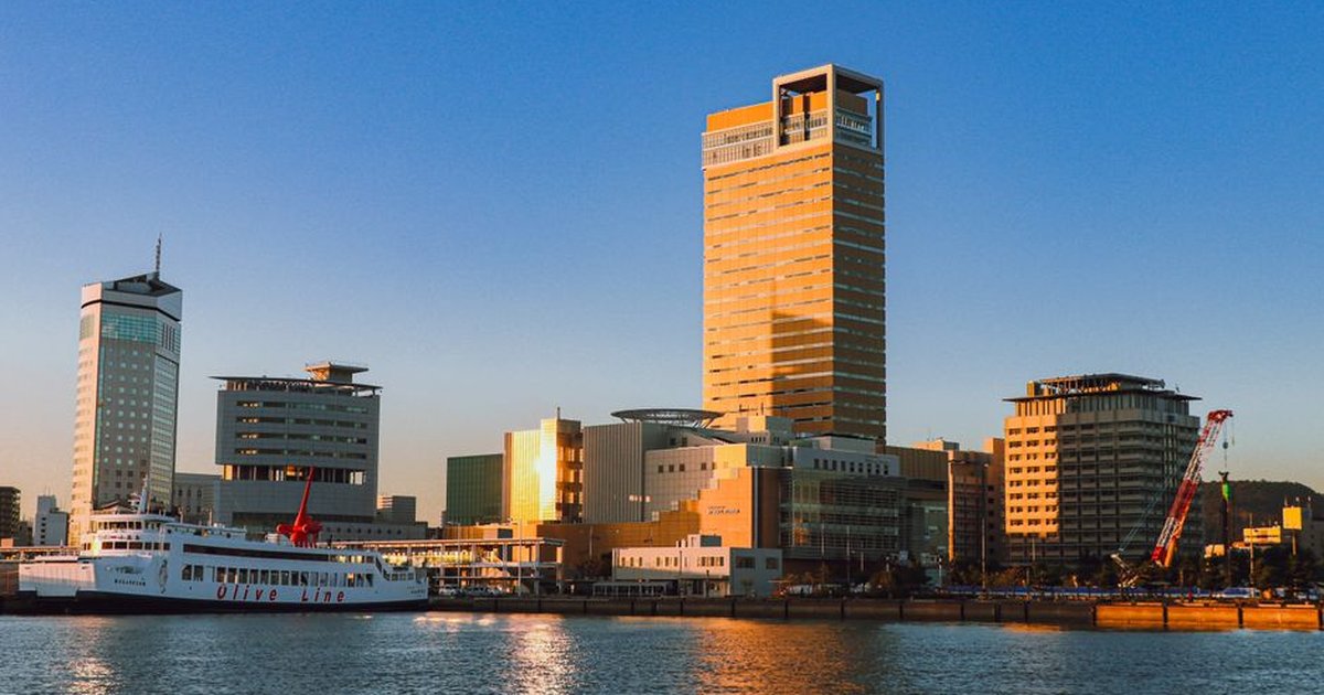 Stunning sunset highlights the skyline and port area of Sunport Takamatsu in Kagawa, Japan.