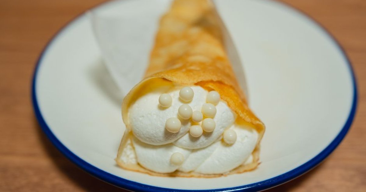 Indulge in a creamy Japanese crepe topped with white chocolate pearls.