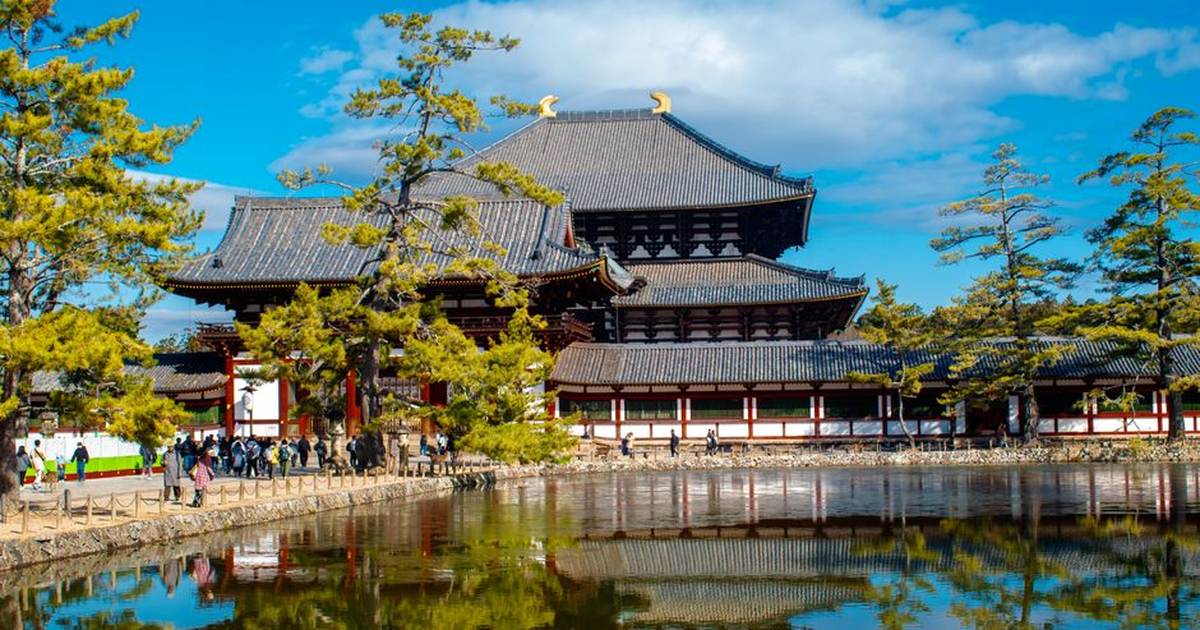 Scenic view of Todaiji Temple reflected in a tranquil pond, Nara, Japan.