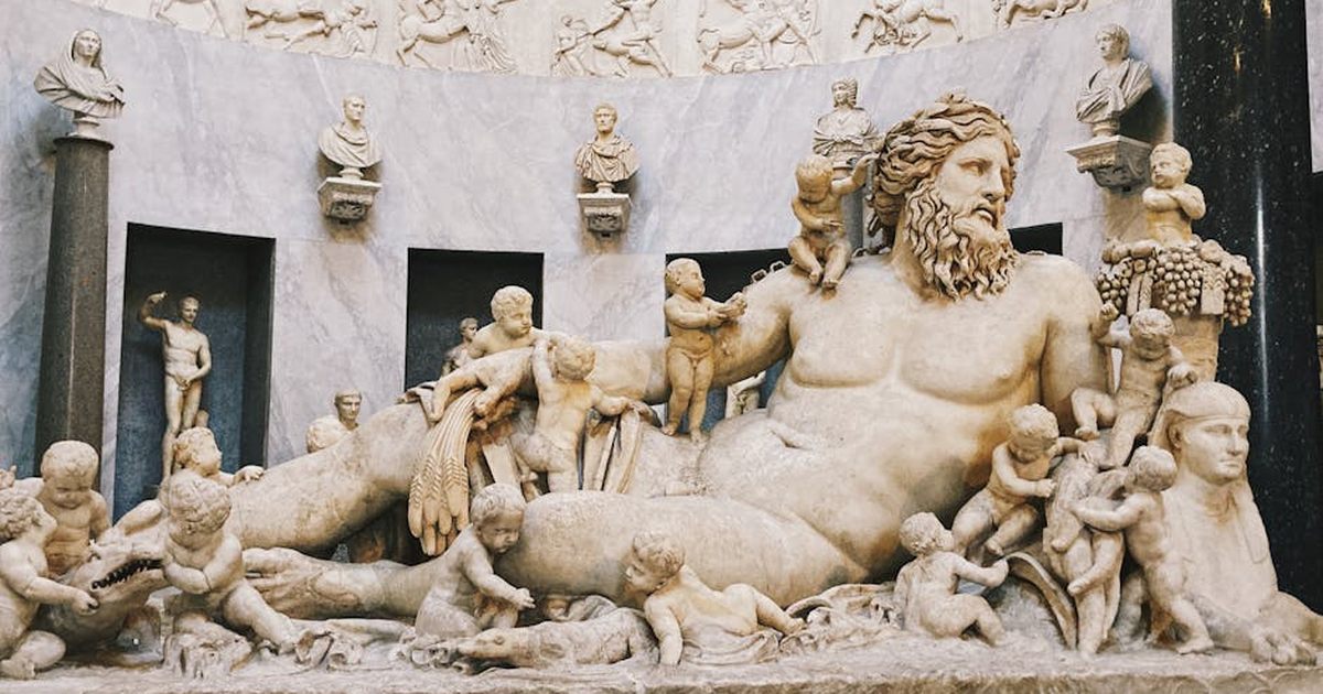 Detailed view of an ancient Roman marble sculpture depicting a mythological scene, rich in detail and artistry.