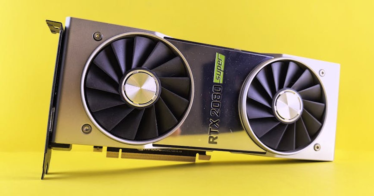 Close-up of a RTX 2080 Super graphics card against a bright yellow backdrop, showcasing high-tech design.