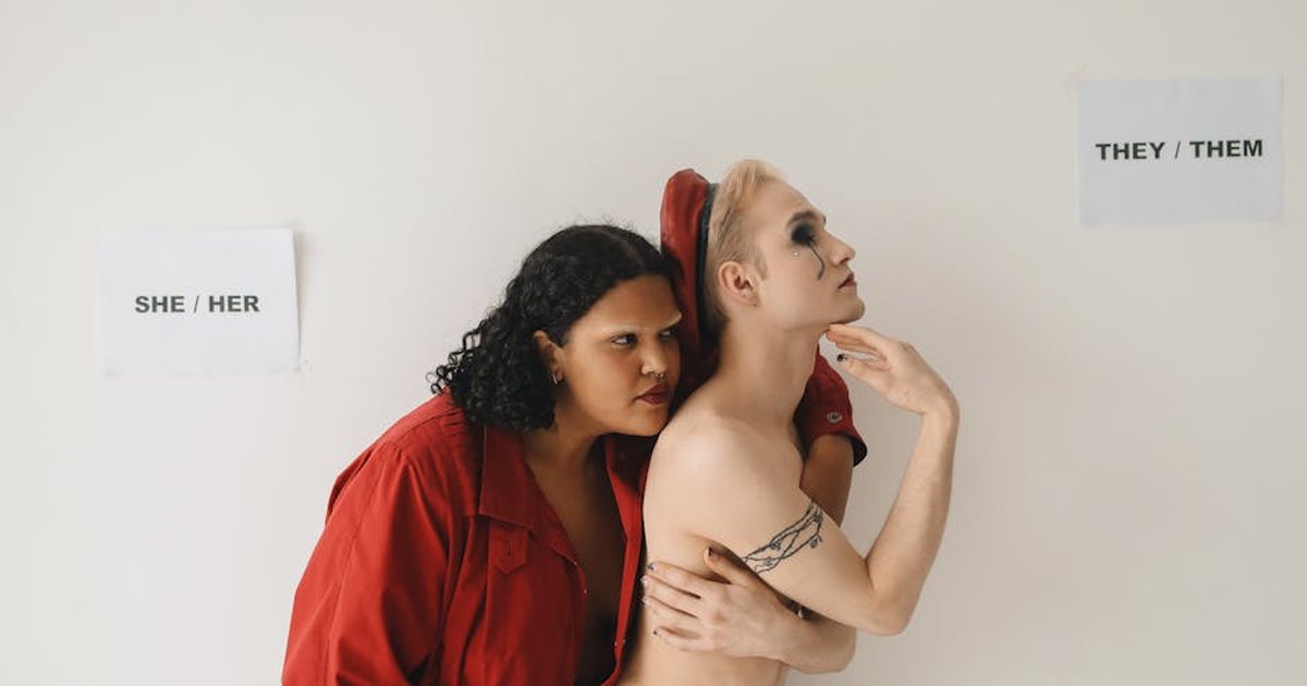 A powerful image capturing expressions of gender identity with individuals embracing diversity and inclusion.