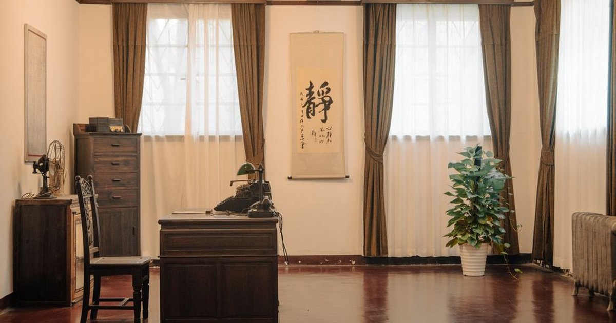 A vintage-style office room in Meiling Palace, Nanjing, featuring classic wooden furniture and Chinese decor.