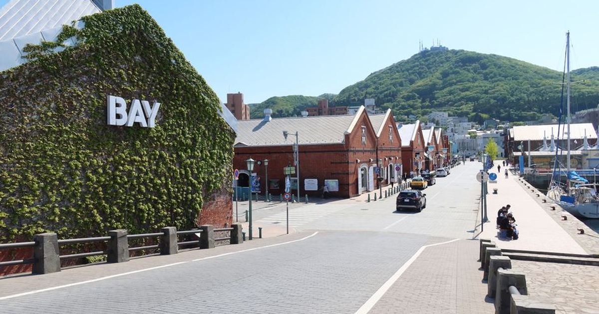 View of the ivy-covered red brick warehouses in Hakodate, Hokkaido, a popular tourist spot.