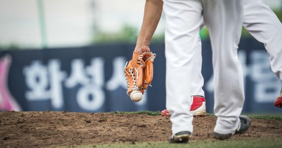 Dynamic capture of a baseball player catching a ball during a game.