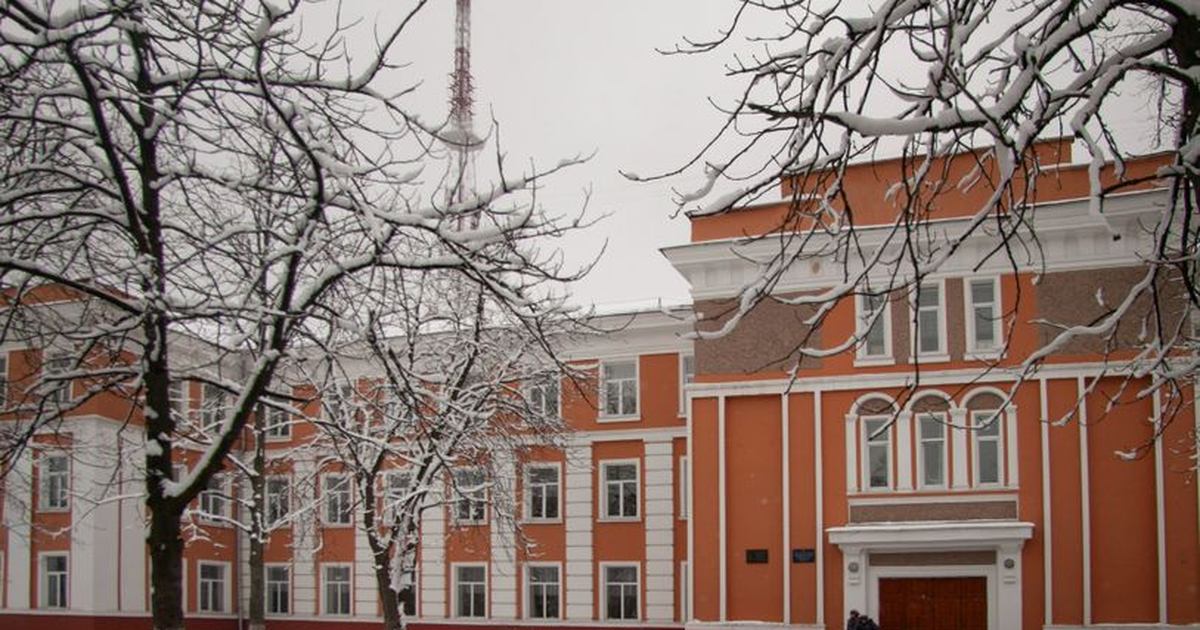 Captivating view of a historic building in Chernihiv, Ukraine covered in snow, showcasing classic architecture.