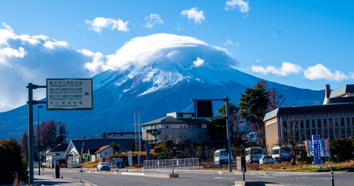 Beautiful view of Mount Fuji with cloud cap seen from Fujikawaguchiko town, Japan.