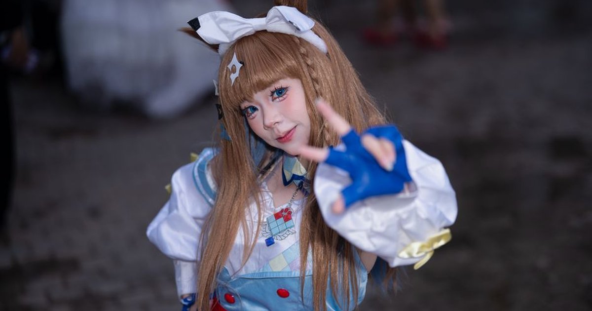 Creative cosplay portrait featuring an adult in vibrant anime-inspired attire outdoors.