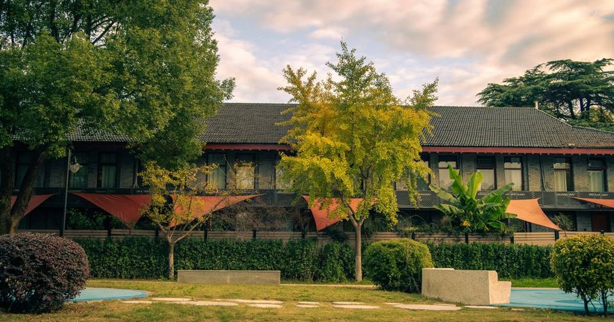 Beautiful garden scene in front of a classic building in Nanjing, Jiangsu Province, China.