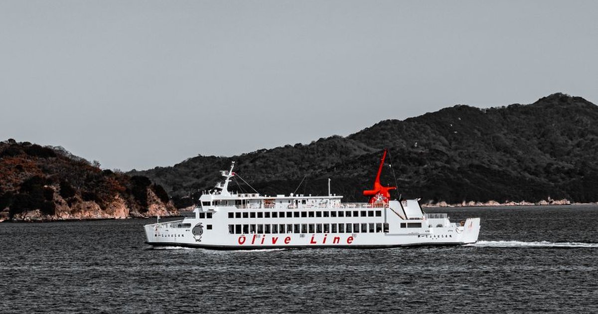 Olive Line ferry cruising near Shodoshima island in Seto Inland Sea, Japan.